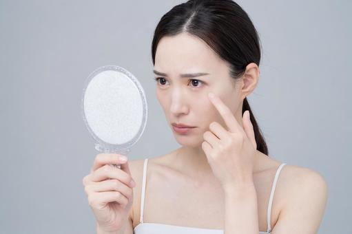 顔イボができる原因